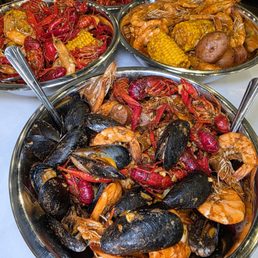 Cajun crawfish, clams, and shrimps Cajun crawfish, clams, and shrimps