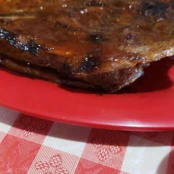 Bucky Bee's BBQ - Sliced slab of pork, bone in.... odd sliced pork - Barbeque Near Me - Cave City, Kentucky