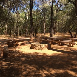Fire pit and tables at group site Fire pit and tables at group site