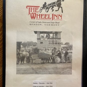 The Wheel Inn - a horse drawn carriage being pulled by two men - American Near Me - Benson, Vermont The Wheel Inn - a horse drawn carriage being pulled by two men - American Near Me - Benson, Vermont