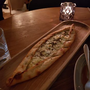 Byblos - truffle cheese pide - Mediterranean Near Me - Toronto, Ontario Byblos - truffle cheese pide - Mediterranean Near Me - Toronto, Ontario