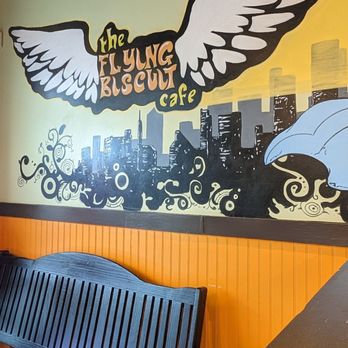 The Flying Biscuit Cafe - a bench and a mural - Breakfast & Brunch Near Me - Roswell, Georgia The Flying Biscuit Cafe - a bench and a mural - Breakfast & Brunch Near Me - Roswell, Georgia