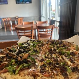 Half Factory Pizza/ Half Greek Pizza Half Factory Pizza/ Half Greek Pizza