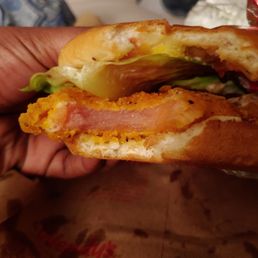 A breaded raw sandwich. A breaded raw sandwich.