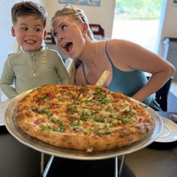 Half shawns pizza and half Hawaiian kick