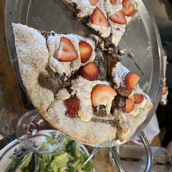 Earl and Isabella's Taverna - a half eaten pizza and a salad - Pizza Near Me - Argyle, Texas Earl and Isabella's Taverna - a half eaten pizza and a salad - Pizza Near Me - Argyle, Texas