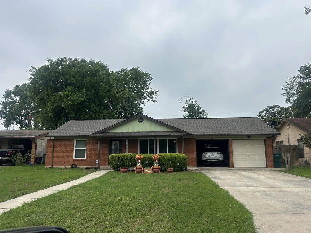 Slide of Trinity Roofing & Restoration