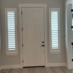 The Blind and Shutter Store - Plantation shutters on sidelights at front door