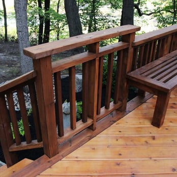 Premier Outdoor Living LLC - a wooden bench on a deck - Landscaping Near Me Premier Outdoor Living LLC - a wooden bench on a deck - Landscaping Near Me