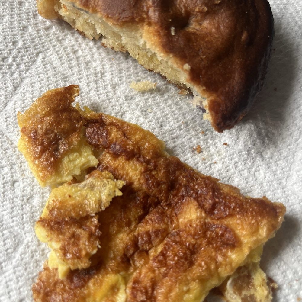 Eggs brown and overcooked blueberry lemon muffin. Eggs brown and overcooked blueberry lemon muffin.