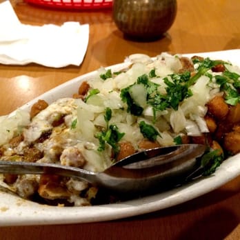 Mumbai Chowk - Samosa Chaat - samosa served with garbanzo beans, curry, yogurt, and chutneys - Indian Near Me - Newark, California Mumbai Chowk - Samosa Chaat - samosa served with garbanzo beans, curry, yogurt, and chutneys - Indian Near Me - Newark, California