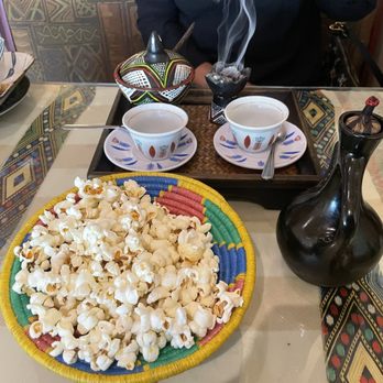 Lalibela Cuisine - The coffee ceremony. Served with popcorn - Ethiopian Near Me - Toronto, Ontario Lalibela Cuisine - The coffee ceremony. Served with popcorn - Ethiopian Near Me - Toronto, Ontario