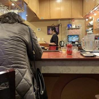 Yen's Cafe - Waiting area at entry/bar. Staff taking phone orders. - Taiwanese Near Me - Ashburn, Virginia Yen's Cafe - Waiting area at entry/bar. Staff taking phone orders. - Taiwanese Near Me - Ashburn, Virginia