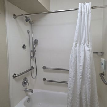 Comfort Inn - Tub/shower combo. Lots of safety bars in what I am guessing is a handicap accessible room. Although no shower chair so. . . - Hotels Near Me - Memphis, Tennessee