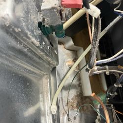 Capital City Appliance Service - Water tube disconnected from valve.