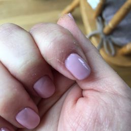 Excess polish smeared around nails. Excess polish smeared around nails.