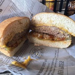 Rouers Grand Slam - 1/3 Cheese Burger w/pickles, raw onion, mustard and ketchup.