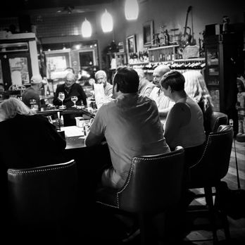 Uncorked - Many tables and a cozy bar top to make friends. - Wine Bars Near Me - Eustis, Florida