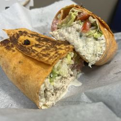 The Sandwich Spot - Cheesy jalapeño, flavored wrap, pressed with chicken salad, lettuce, and tomato
