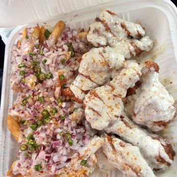 Wing Station - Spicy garlic parm wings I got the station deal, Pop, fries and pound of wings for about 20$ - Chicken Wings Near Me - Markham, Ontario Wing Station - Spicy garlic parm wings I got the station deal, Pop, fries and pound of wings for about 20$ - Chicken Wings Near Me - Markham, Ontario