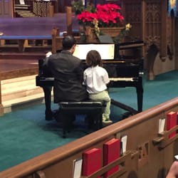 Los Angeles School of Music - A teacher playing a duet with his student at the 2015 Winter Recital.