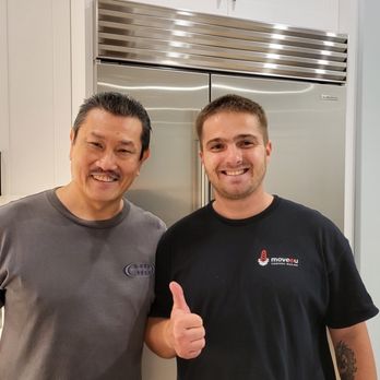 Move4U - Mike, Team Foreman, with my husband after a successful move. - Movers Near Me - Chicago, Illinois Move4U - Mike, Team Foreman, with my husband after a successful move. - Movers Near Me - Chicago, Illinois