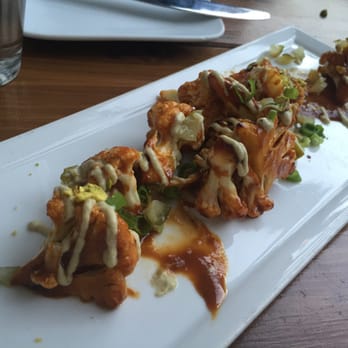 SunCafe - The Cauliflower starter.. We didn't like it, raw cauliflower with a kinda spicey bbq sauce just didn't seem like a good mix :/ - Vegan Near Me - Studio City, California