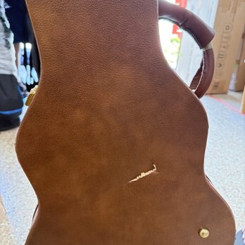 Move Happy - damaged electric guitar - Movers Near Me - Los Angeles, California Move Happy - damaged electric guitar - Movers Near Me - Los Angeles, California