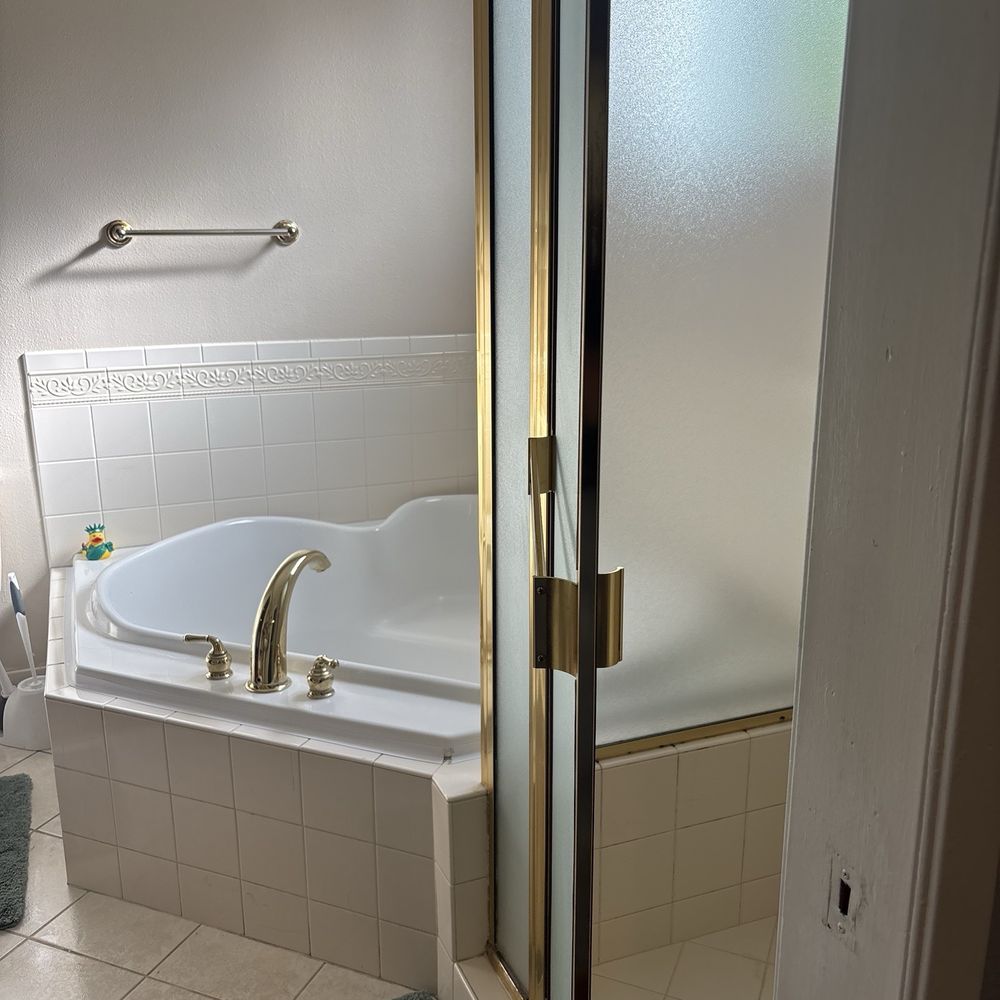 Frosted shower glass is clean! Before it had so many hard water stains. Frosted shower glass is clean! Before it had so many hard water stains.
