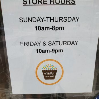 Molly's Cupcakes - Naperville - Hours posted on window at store. States 10:00 AM for Saturday. - Cupcakes Near Me - Naperville, Illinois