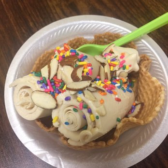 Rolled Ice Cream - Lavender rolled ice cream with almonds and sprinkle - Ice Cream & Frozen Yogurt Near Me - Orlando, Florida Rolled Ice Cream - Lavender rolled ice cream with almonds and sprinkle - Ice Cream & Frozen Yogurt Near Me - Orlando, Florida