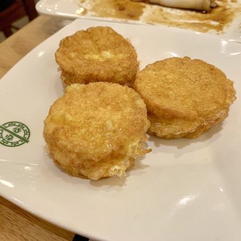 Tim Ho Wan - Hell's Kitchen - Custard dessert bun - not a fan. Tasted sort of like a soggy funnel cake with custard inside - Dim Sum Near Me - New York, New York Tim Ho Wan - Hell's Kitchen - Custard dessert bun - not a fan. Tasted sort of like a soggy funnel cake with custard inside - Dim Sum Near Me - New York, New York