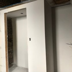 English Construction - Cedar apartment building framing, drywall, taping, texture and primer.