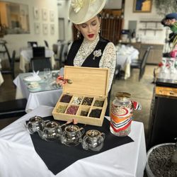 Chez Bacchus - Melissa explaining each tea available with expertise