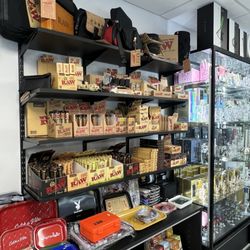 Essentials Vape and Smoke Shop - Wall organize with raw products