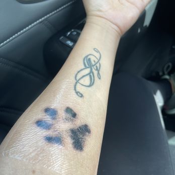 Fat Kat Tattoo & Body Piercing - Paw print - Tattoo Near Me - Jacksonville, Florida