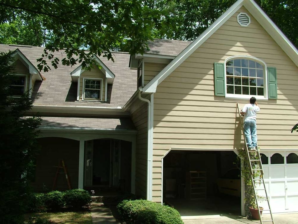 Slide of Custom Solutions Construction & Central Texas Gutters