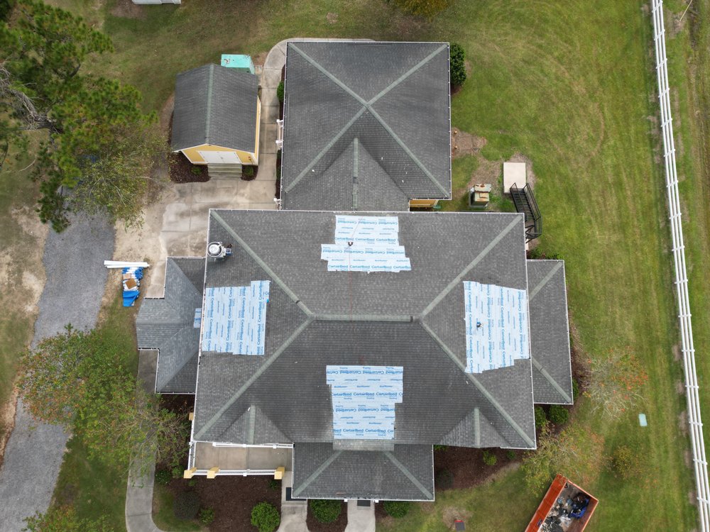 Slide of Martinelli Roofing