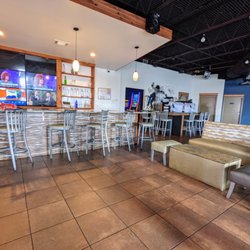 N3dos Restaurant & Lounge - Inside. Bar, dining room, game room, DJ stage, and lounge. Dance floor too, I think.
