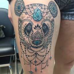 Henna styled panda bear tattoo with teal jewels Henna styled panda bear tattoo with teal jewels