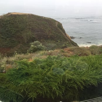 Moss Beach Distillery - View from our table. The coast often has fog in the evening. - Seafood Near Me - Moss Beach, California Moss Beach Distillery - View from our table. The coast often has fog in the evening. - Seafood Near Me - Moss Beach, California