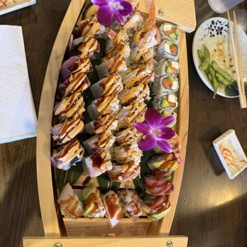 Volcano - Sushi rolls brought out for the table on a boat, awesome! - Chinese Near Me - Odessa, Texas Volcano - Sushi rolls brought out for the table on a boat, awesome! - Chinese Near Me - Odessa, Texas