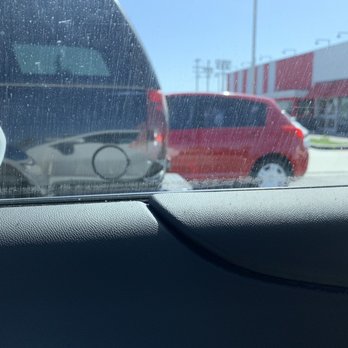 Audio MotorSport - The tint adhesive left on my window after my tint was removed by the very establishment who installed the tint - Car Stereo Installation Near Me - Carson, California