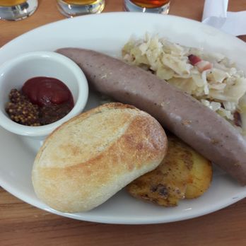 Waldmann Brewery - A wurst plate consisting of a in-house made bratwurst, hard roll, bacon sauerkraut, and duck fat potatoes. - Breweries Near Me - Saint Paul, Minnesota Waldmann Brewery - A wurst plate consisting of a in-house made bratwurst, hard roll, bacon sauerkraut, and duck fat potatoes. - Breweries Near Me - Saint Paul, Minnesota