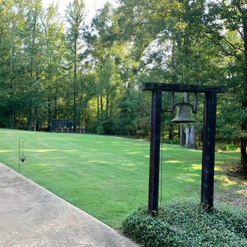 Glover's Lawn Care - a path leading to a house - Lawn Services Near Me