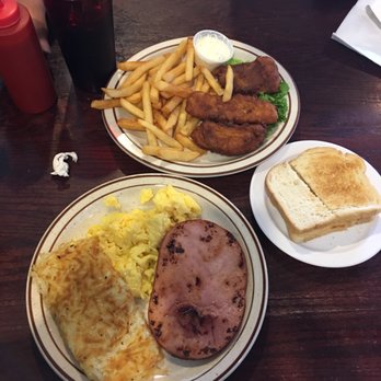 Pelton Cafe - Fish and chips on top and a ham breakfast with hash-browns and two eggs. - Breakfast & Brunch Near Me - San Leandro, California Pelton Cafe - Fish and chips on top and a ham breakfast with hash-browns and two eggs. - Breakfast & Brunch Near Me - San Leandro, California