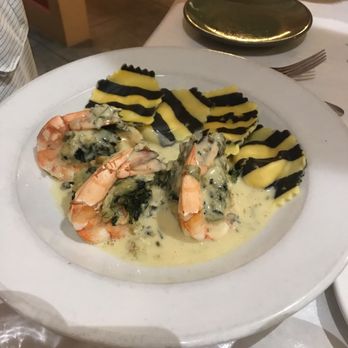 Traders - Jumbo shrimp stuffed with crabmeat served over lobster ravioli, a special. - Seafood Near Me - Sanibel, Florida Traders - Jumbo shrimp stuffed with crabmeat served over lobster ravioli, a special. - Seafood Near Me - Sanibel, Florida