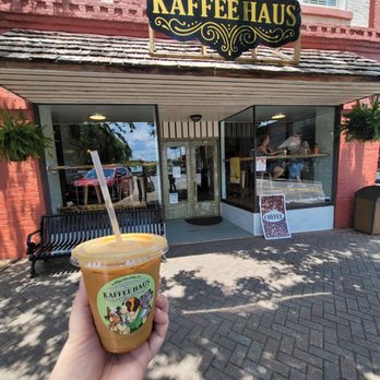 Das Kaffee Haus - Store front and oat milk latte - Coffee & Tea Near Me - Blue Ridge, Georgia