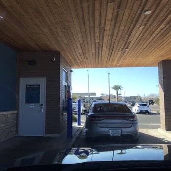 Dutch Bros Coffee - Slick drive through covering. - Juice Bars & Smoothies Near Me - Mesa, Arizona