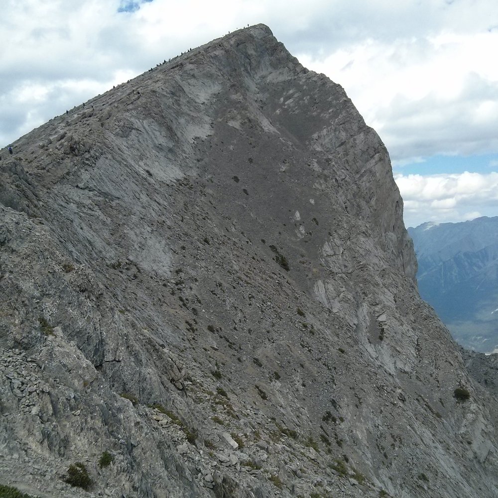 Ha Ling Peak Hike - Ha ling peak. If u zoom in, on the left side of the mountain are people hiking up and down! - Hiking Near Me - Canmore, Alberta Ha Ling Peak Hike - Ha ling peak. If u zoom in, on the left side of the mountain are people hiking up and down! - Hiking Near Me - Canmore, Alberta